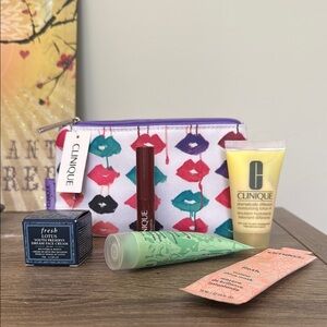 Clinique black honey lipstick and samples of hair are and moisturizer